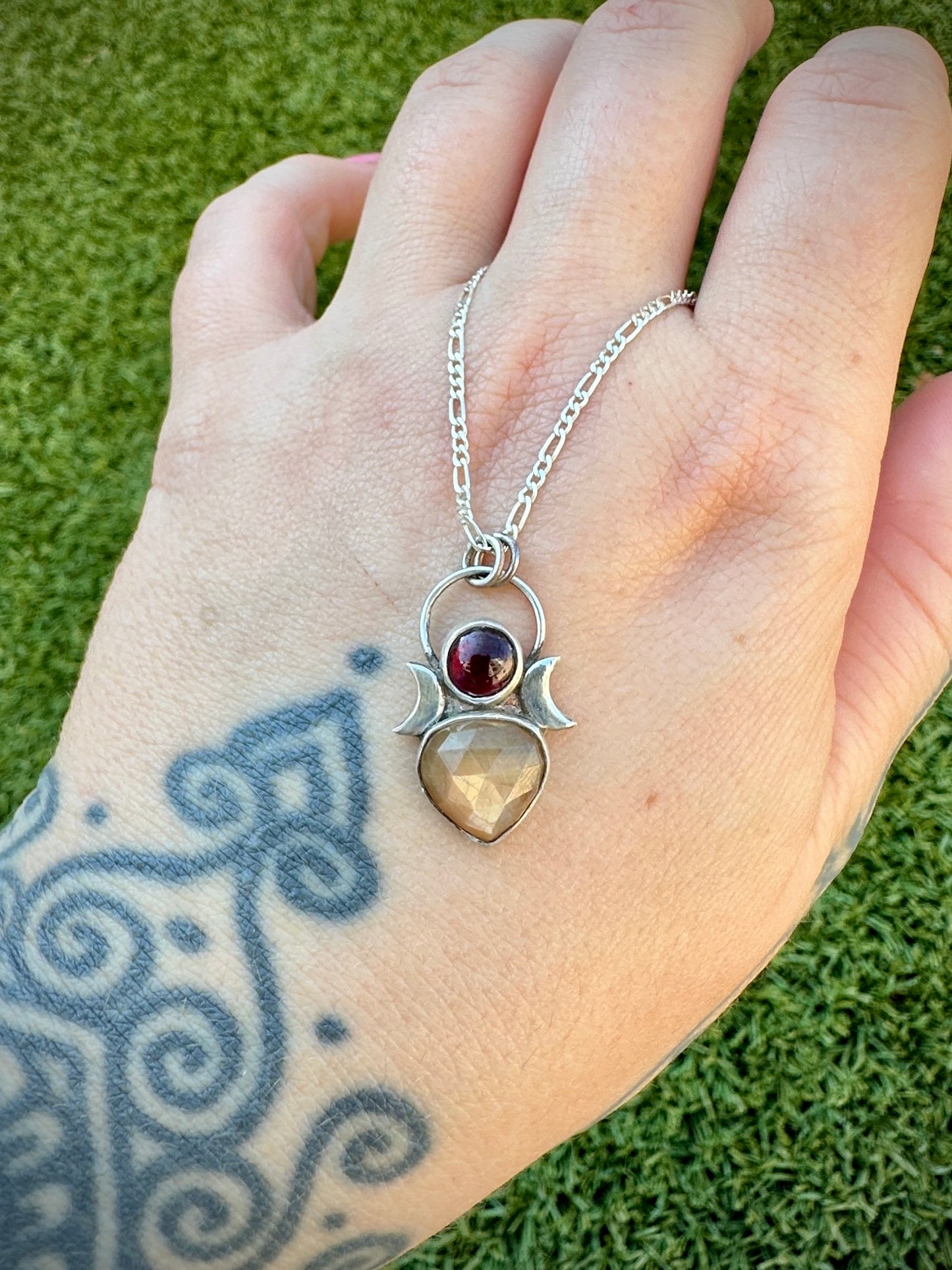 Garnet and sapphire talisman