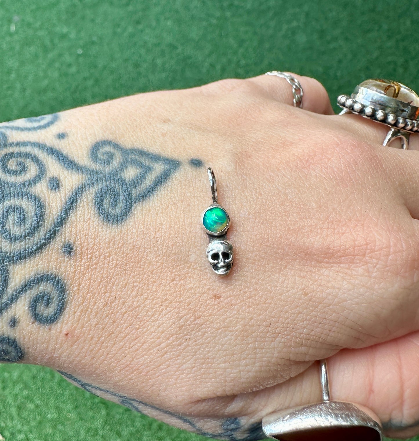 Petite opal skull charm