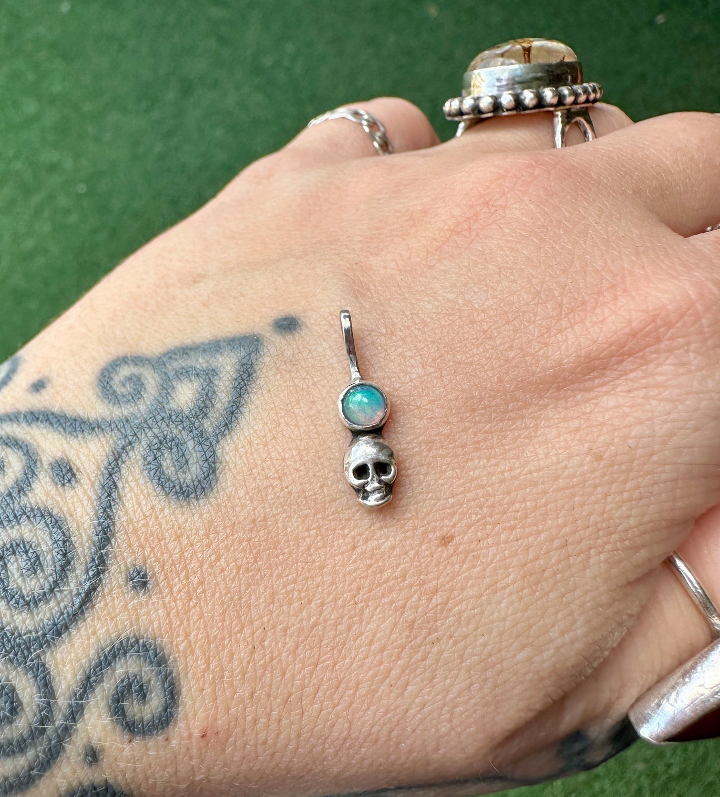 Petite opal skull charm