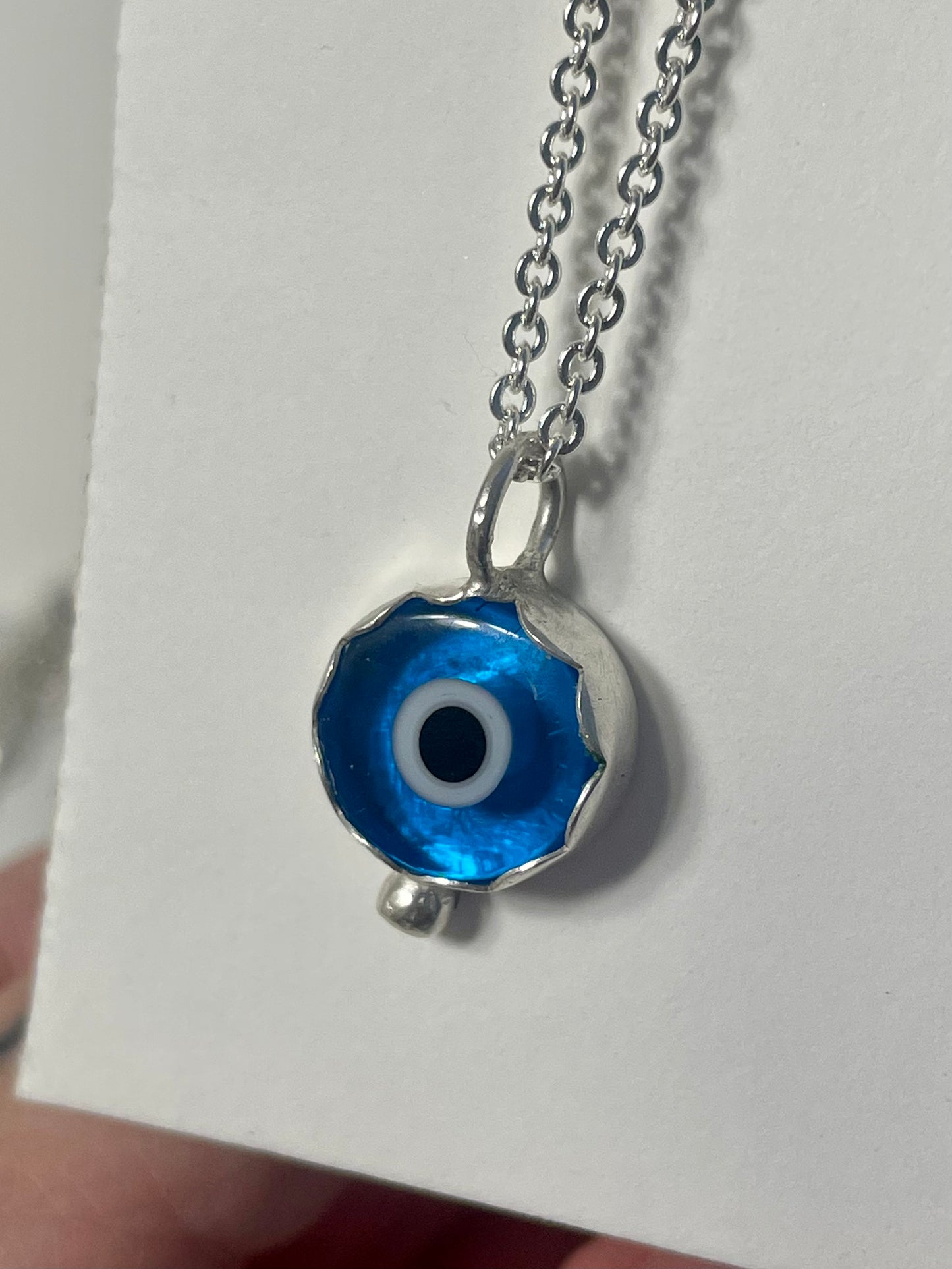 Scalloped evil eye